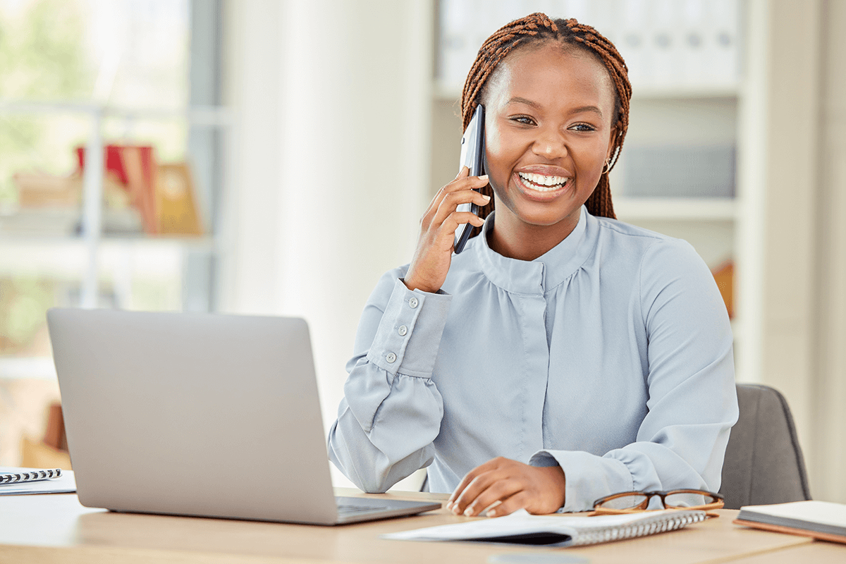 black-woman-on-laptop-business-phone-call-and-com-2022-12-08-23-42-48-utc